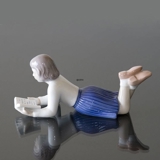 Merete, Girl lying and reading her book, Bing & Grondahl figurine no. 2304