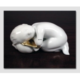 Seaboy resting, gold decorated Bing & grondahl figurine no. 2315