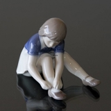 Girl Buttoning her Shoe, Bing & Grondahl figurine no. 2317