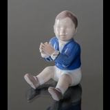 Boy sitting clapping his hands, Bing & Grondahl figurine No. 2337