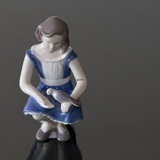 Girl with Pigeon, feeding it lovingly, Bing & Grondahl figurine No. 2340