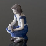 Girl with Pigeon, feeding it lovingly, Bing & Grondahl figurine No. 2340