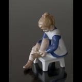 Marianne, girl tying shoelace, Bing & Grondahl figurine no. 491 or 2373