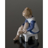 Marianne, girl tying shoelace, Bing & Grondahl figurine no. 491 or 2373