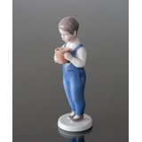 Boy standing with bucket, Joergen, Bing & Grondahl figurine no. 2401