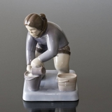 Greenlandish woman with bucket pouring water in, Bing & Grondahl figurine No. 2416