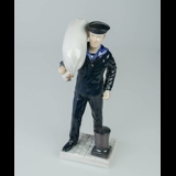 Mariner in service uniform with sailor's bag, Bing & Grondahl figurine no. 2486