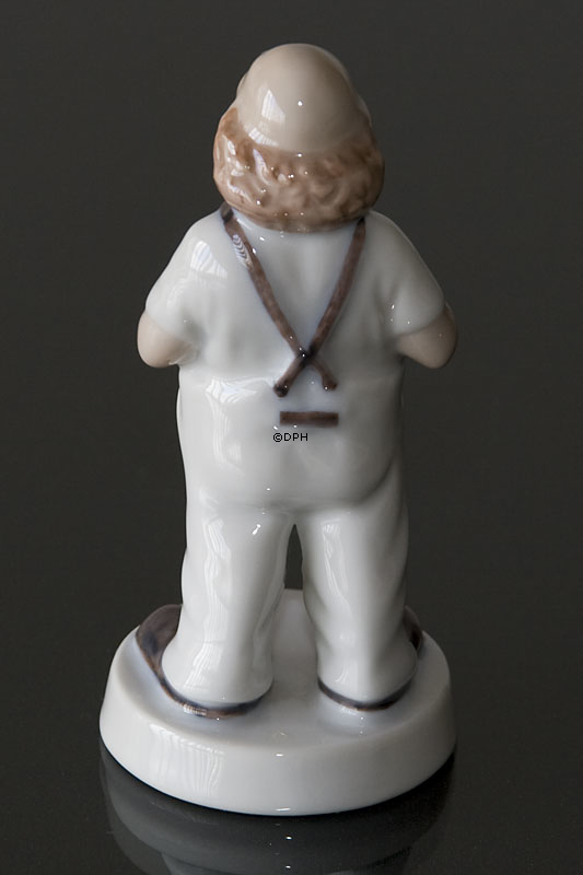 Klovn med hænderne på selerne, Bing & Grøndahl figur nr. 511 eller 2511