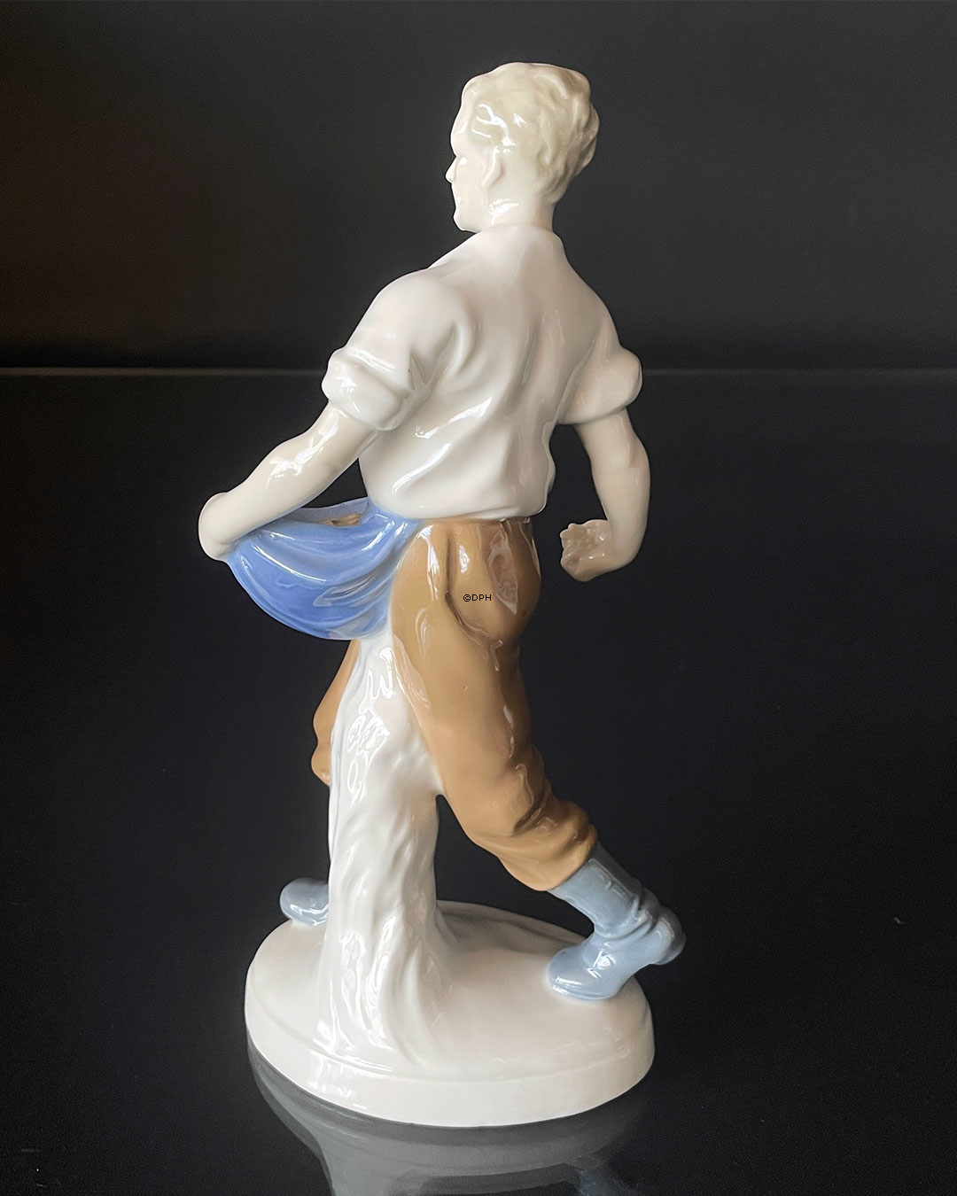 Figur af mand med såsæd