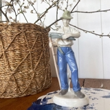 Figur af mand med le