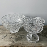 Crystal glass bowl on a small base with engravings