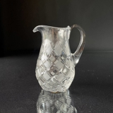 Crystal glass jug with engravings