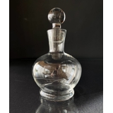 Glass carafe with subtle pattern