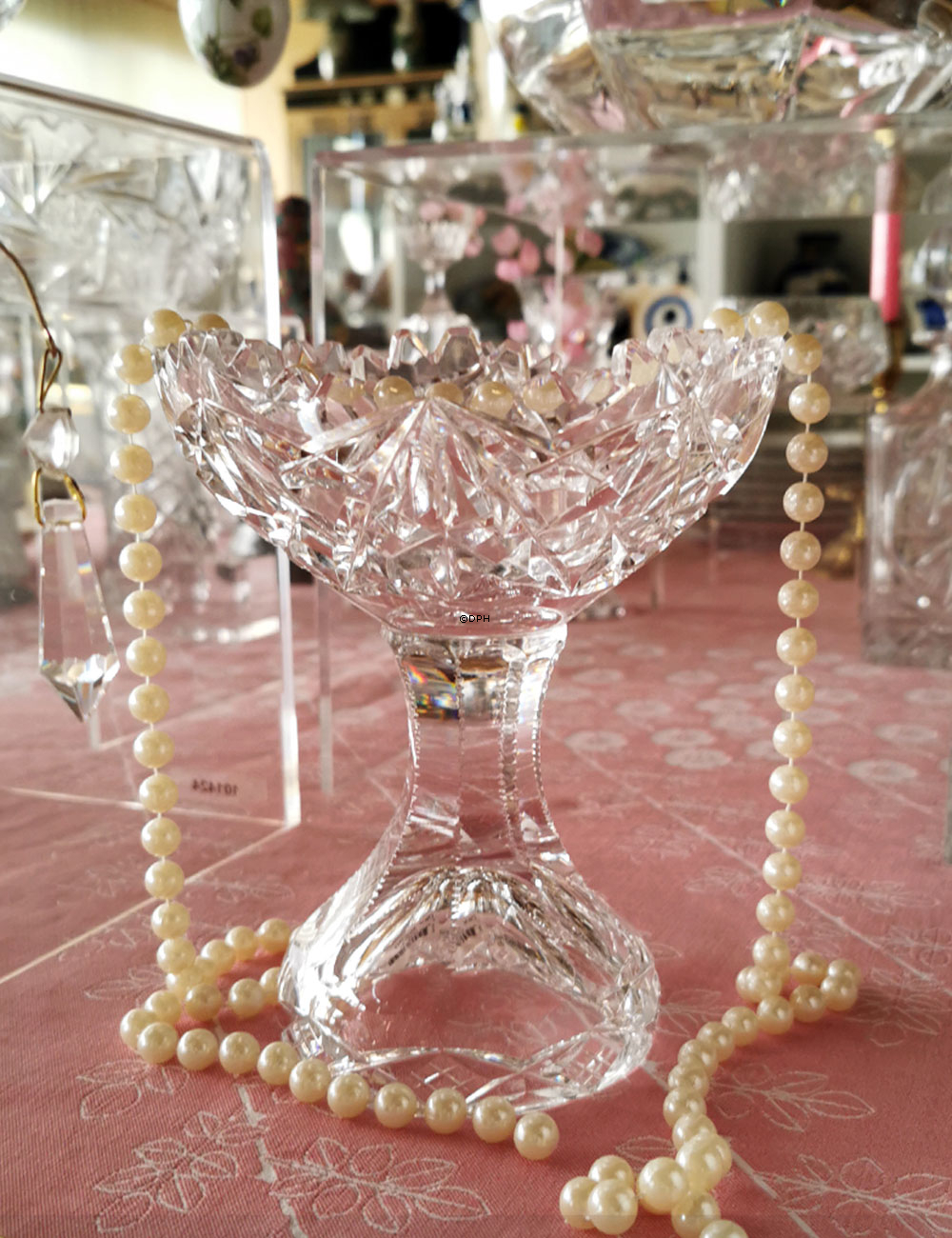 Krystal glas skål på fod med slibninger