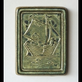 Relief with Fisherman with dog in his boat, Soholm Stoneware No. 3506