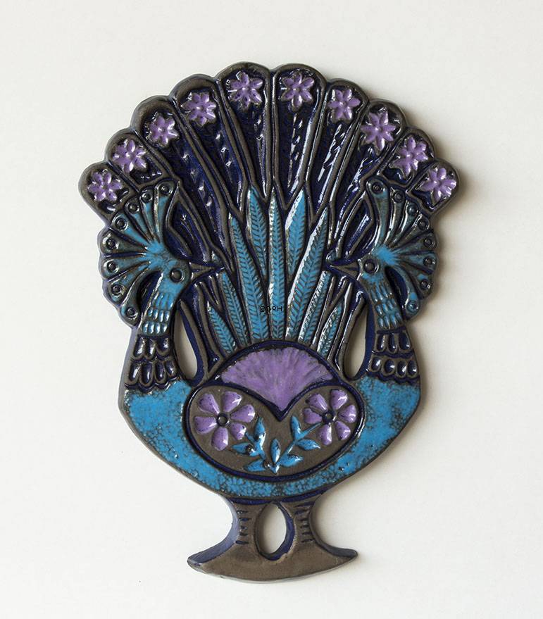 Relief med to påfugle, stentøj