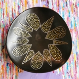Ceramic dish, black with yellow dots