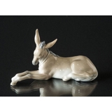 Lladro figurine of donkey, lying