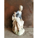 Figurine of girl with Rooster, marked no. 243