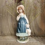Marco Giner figurine of a girl with a flower and teddy bear