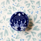 Royal Copenhagen porcelæns knap, F K 1910