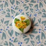 Royal Copenhagen porcelain button, Yellow flower