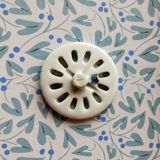 Royal Copenhagen porcelain button, without motif, with a ribbed edge