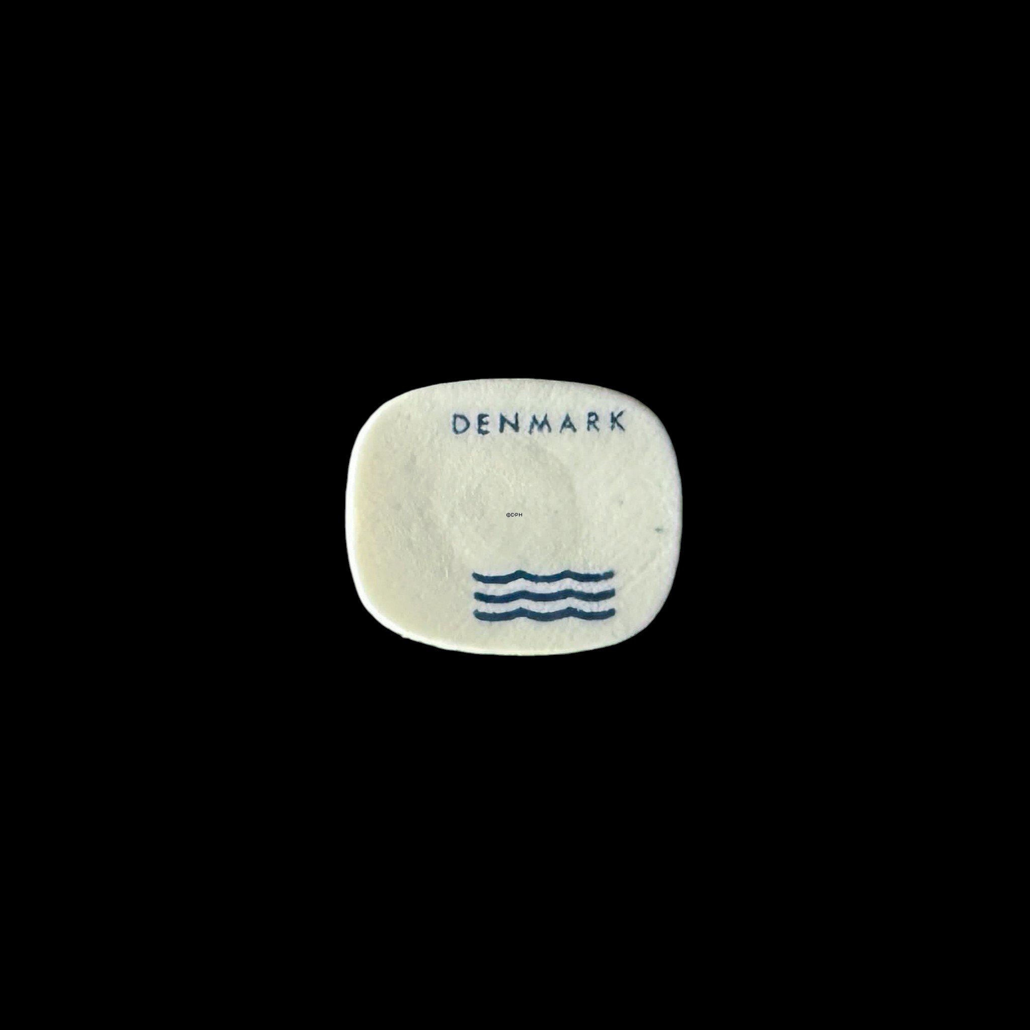 Royal Copenhagen porcelæns cabochon med motiv af løve