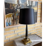 Vintage table lamp in black wood and brass.