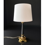 Vintage table lamp in black wood and brass.