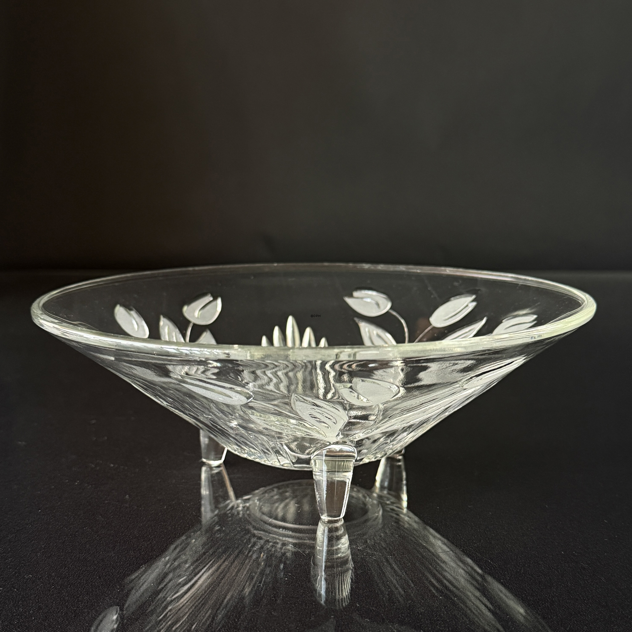Glas skål med blomst