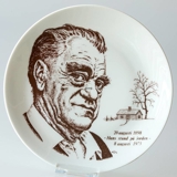 Elgporslin plate with Vilhelm Moberg in brown colour