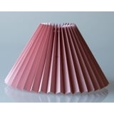 Pleated lamp shade of rose coloured chintz fabric, sidelength 25cm