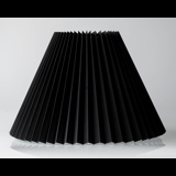 Pleated lamp shade of black chintz fabric, sidelength 35cm