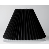 Pleated lamp shade of black chintz fabric, sidelength 35cm