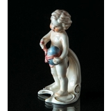 Goebel Hummel Monthly Figurine April Girl with Easter egg