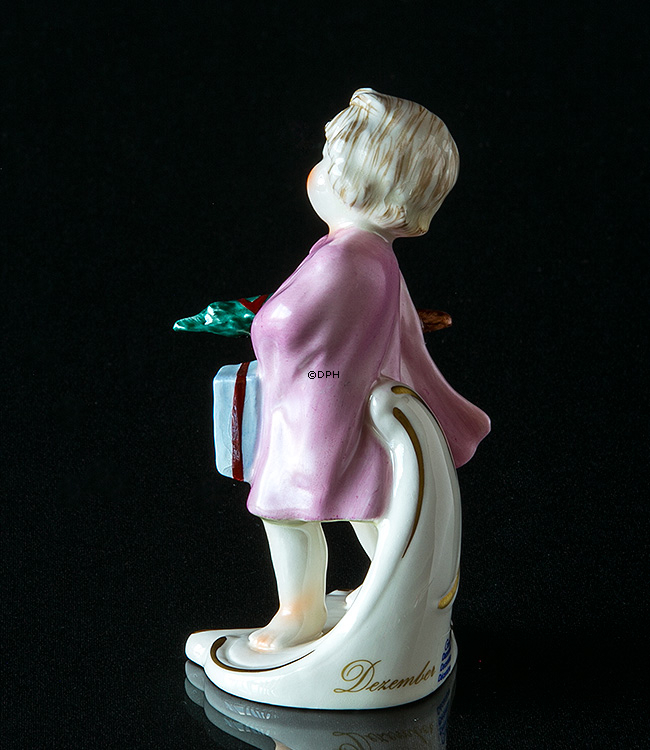 Goebel Hummel månedsfigur december pige med juletræ og gaver