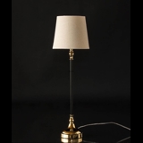 Golden and black lamp with round shade