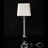 Lamp in silver with bright lampshade