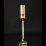 Goldener Kerzenständer mit knisterndem Glas