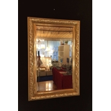 Facet cut mirror in golden flat and shiny finish