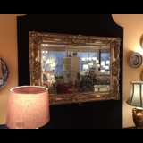 Faceted mirror with frame in golden silver