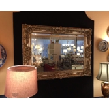 Faceted mirror with frame in golden silver