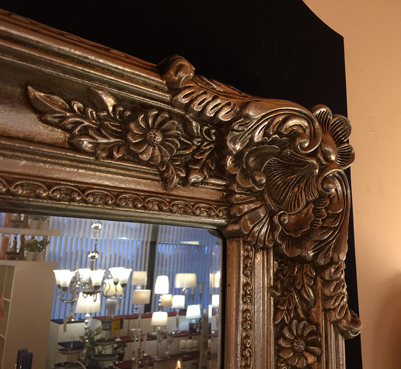 Facetslebet spejl med ramme i gyldent sølv