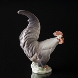 Rooster looking for the sun, Royal Copenhagen bird figurine No. 1025