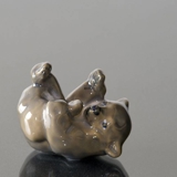 Brown bear lying down playing with its Foot, Royal Copenhagen figurine No. 1124