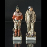 Greenlandic couple, woman and man, Royal Copenhagen overglaze figurine no. 12224 and 12225