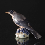 Redwing sitting on berries, Royal Copenhagen figurine No. 1235