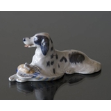 Setter having apported a pheasant, Royal Copenhagen dog figurine No. 1533