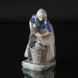 Woman collecting Potatoes, Royal Copenhagen figurine no. 1549